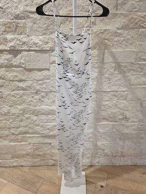 BCBGeneration White Maxi Slip Skirt with Black Bird Print